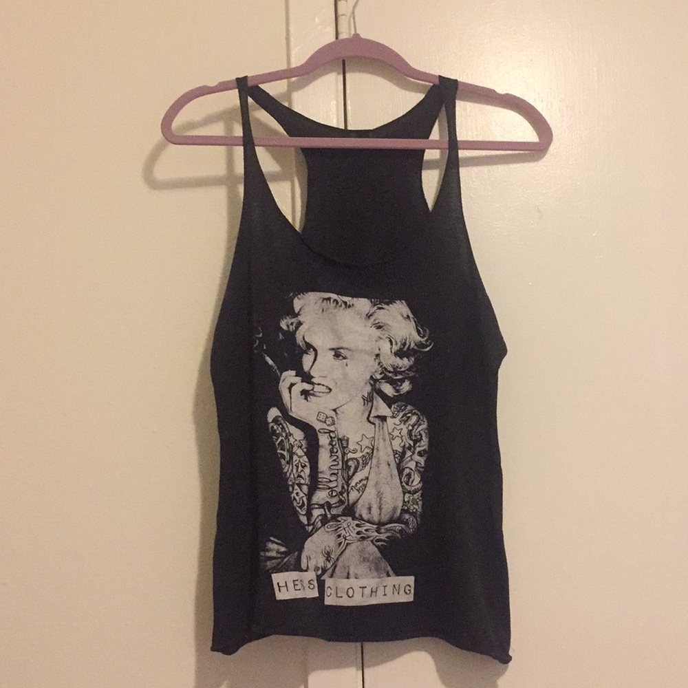 Hess Clothing tank. Runs size smaller than sized.